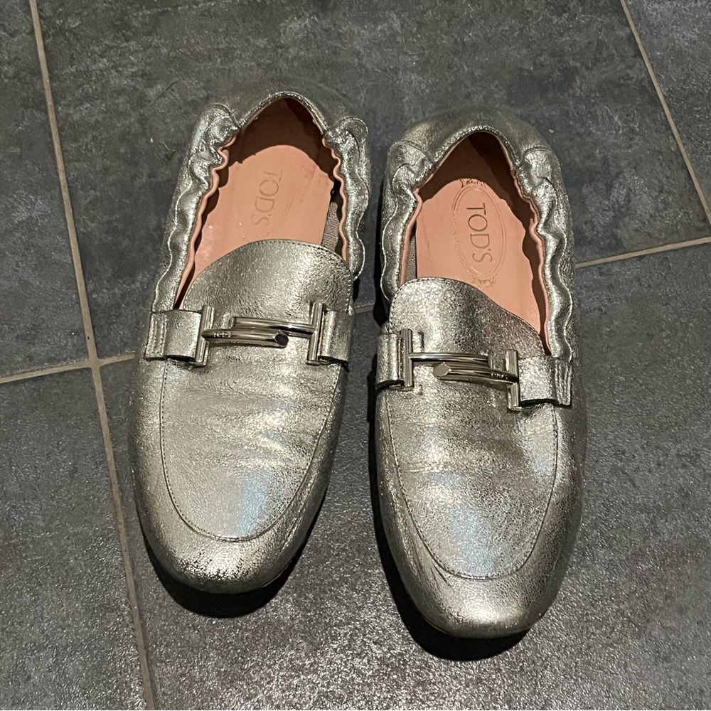 Tod’s silver shimmer flats loafers